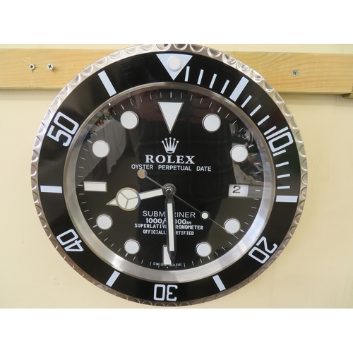 153 - Wall clock in the form of a Rolex Submariner - black dial and bezel with date aperture