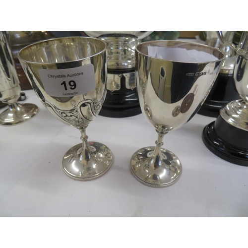 19 - Two small silver goblet trophies, Sheffield 1907 and 1912 (one not engraved), wt. 7 ozt