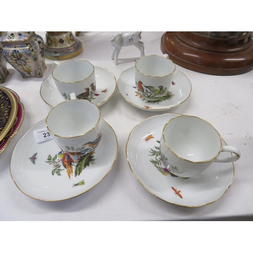 23 - A set of four Meissen tea cups and three saucers with decoration of birds and insects (Amended (one ... 