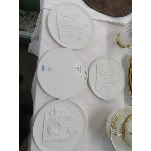 47 - Four Royal Copenhagen bisque parianware discs having classical scenes