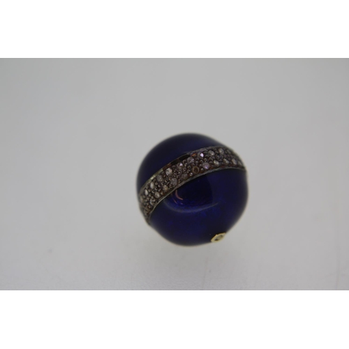 139 - A blue enamel diamond set double row bead