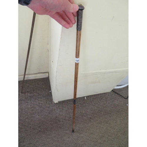 150 - A ladies' walking cane with a silver metal top