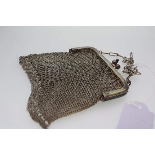 271 - A silver metal chain mail purse with blue stones to clasp