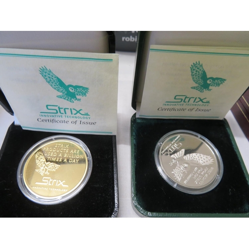 6 - Three Strix Queen's award medals, cased with certificates