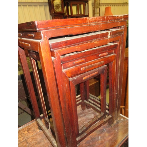 112 - Chinese hardwood nest of 4 tables