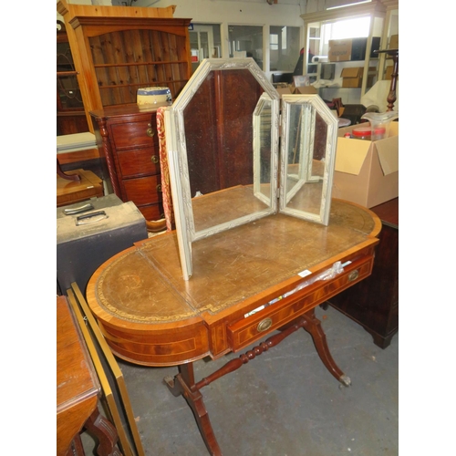 116 - Table with leather insert to top, single drawer and flip up ends on turn stretcher and brass claw fe... 