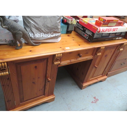 204 - Pine knee hole desk with cupboard to each end