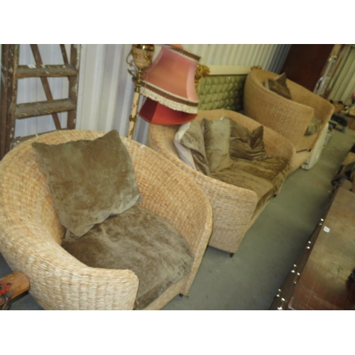 224 - Three piece cane suite comprising settee, two chairs and a low table