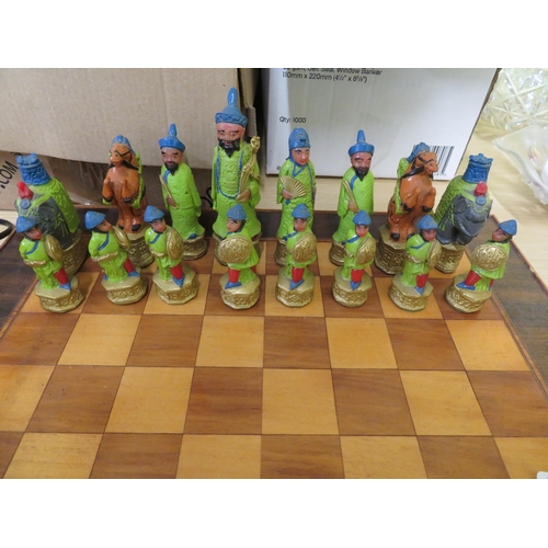 258 - Oriental figure chess set