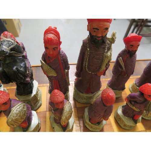 258 - Oriental figure chess set