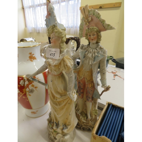 415 - Pair of porcelain figurines - ht. 15 ins