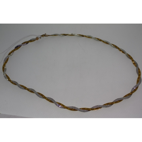 379 - 9ct two colour gold twist necklace, 8.5grams