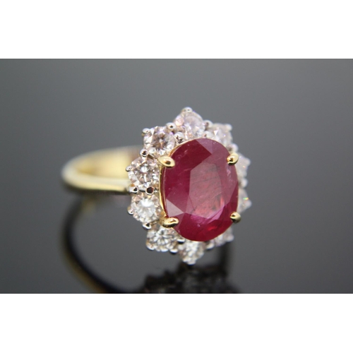 385 - 18ct gold oval ruby diamond cluster ring, ruby 4ct approx, size O