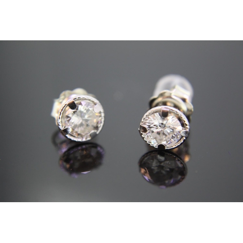 460 - Pair of diamond earstuds, total 1.3ct, set in white gold