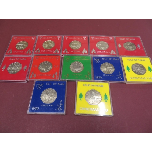 526 - Twelve cased Isle of Man Christmas 50p coins