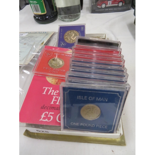 528 - Fourteen cased Isle of Man £1 coins, one cased £2 coin and six cased Isle of Man £5 coins