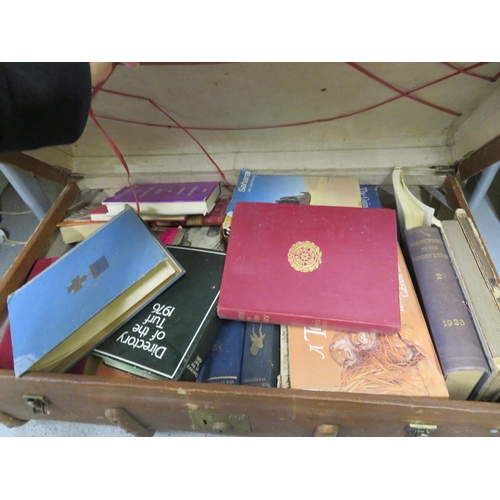 148 - Travel trunk full of assorted books