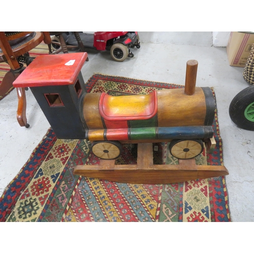 187 - Well made rocking horse in the form of a train, Height 22ins x width 12ins x length 28ins