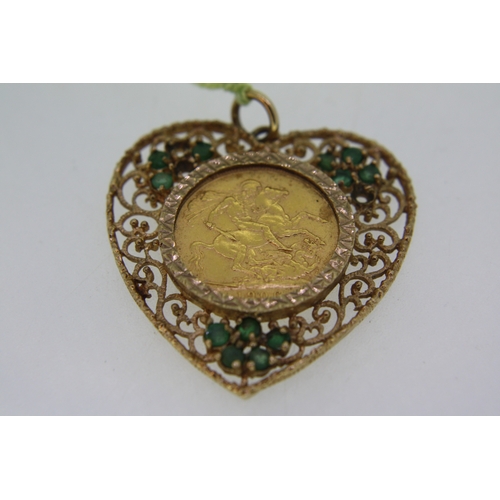 72 - 1906 9 ct. gold heart shaped pendant set with emeralds - total wt. 15.5 grms.