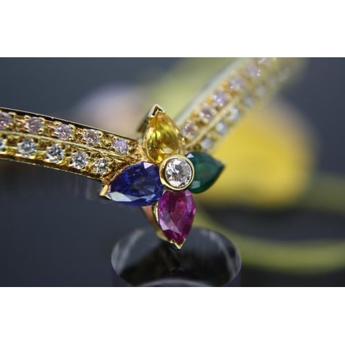 305 - 18ct gold Boodles diamond bracelet with central ruby, sapphire, emerald and citrine flower decoratio... 