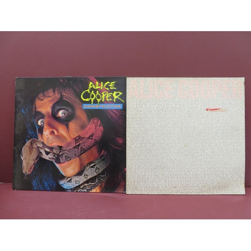 37 - Two Alice Cooper vinyl - Constrictor & Zipper catches skin