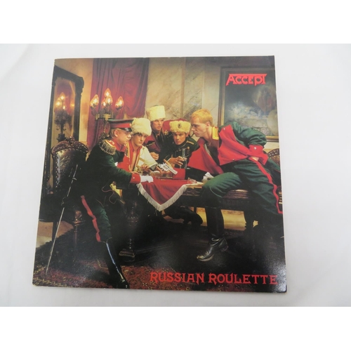 77 - Two Accept LPs - Balls to the wall (PRT25791) & Russian Roulette (PRT 26893) plus 12