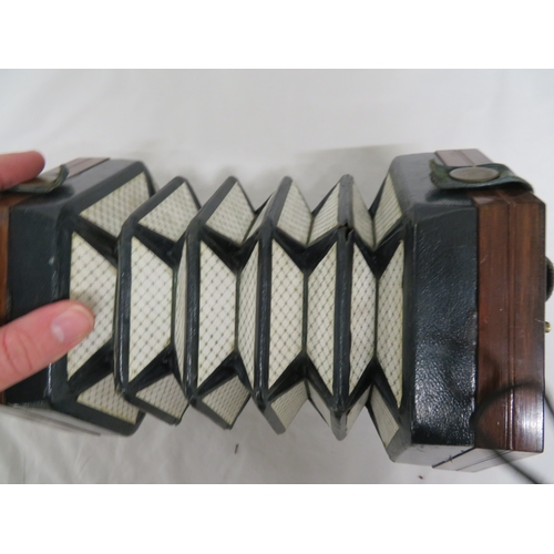 144 - Concertina by C Wheatstone Numbered 6089 - cased together with another Concertina (in need of repair... 