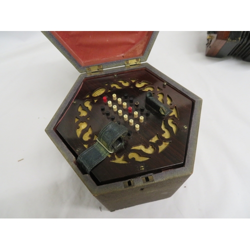 144 - Concertina by C Wheatstone Numbered 6089 - cased together with another Concertina (in need of repair... 