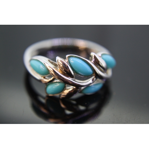 205 - Silver and turquoise ring with leaf decoration, size U