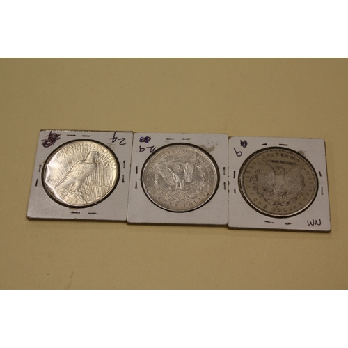 213 - Three American silver dollars, 1) Liberty 1928, 2) Morgan 1885, 3) Morgan 1892