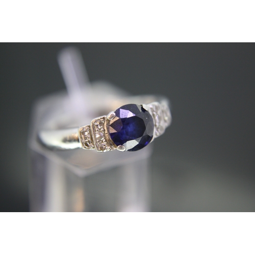 222 - Platinum sapphire ring with diamond shoulders in the Art Deco style, size M/N