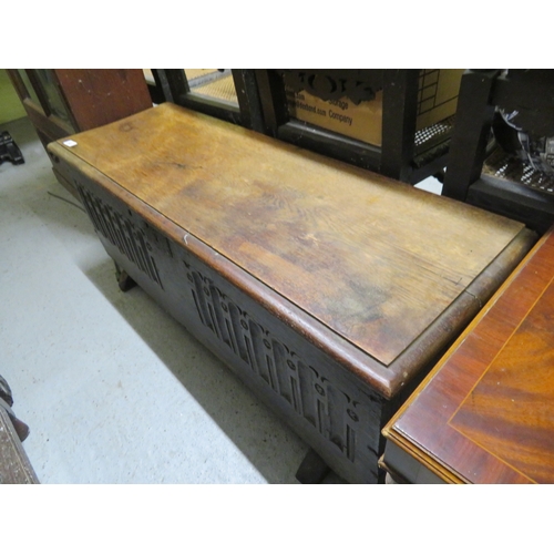 360 - 18thC narrow coffer with carved decoration to front on block feet