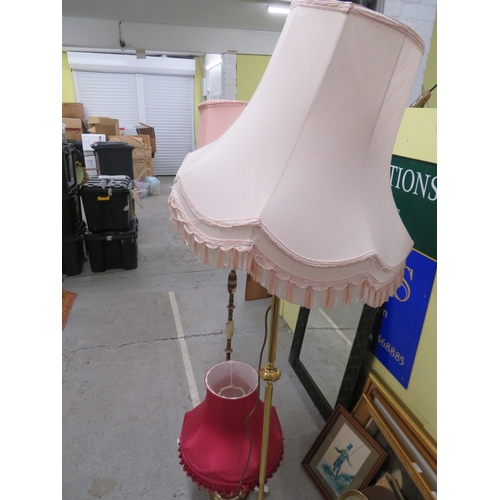 380 - Two floor lamps and a table lamp