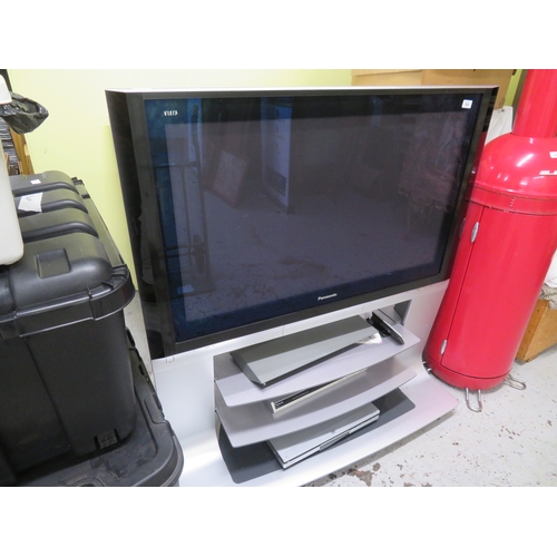 384 - Panasonic TV on stand, includes DVD player, 43ins