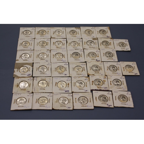 155 - Approx 80 silver half dollars (carded 90% silver)