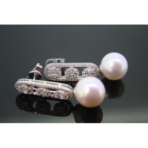 36 - 18ct White Gold long drop Art Deco style earrings, set with diamonds and large cultured pearls