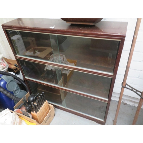 60 - Three shelf bookcase with sliding glass doors