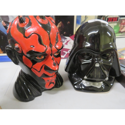 115 - Two Star Wars money boxes, Darth Maul and Darth Vader plus a silicone Yoda