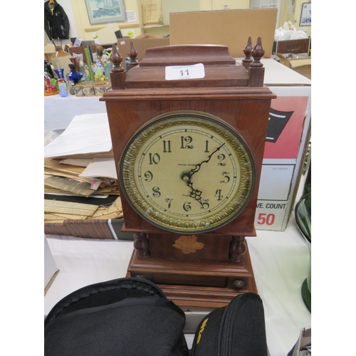 11 - Mantel clock in a mahogany case