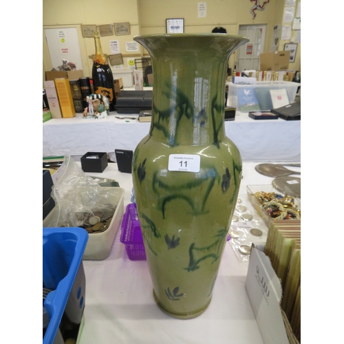 11 - Oriental tall vase with Goat decoration on an olive green ground - ht. 22 ins approx.