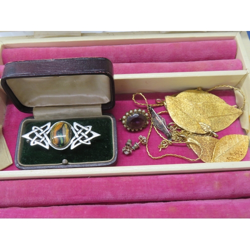 68 - Jewellery box containing ear studs, brooches, gold plated leaf necklace