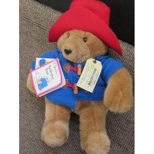 7 - A Judy Senk Teddy Bear with striped tunic and straw hat - length 10 ins approx. plus Paddington and ... 