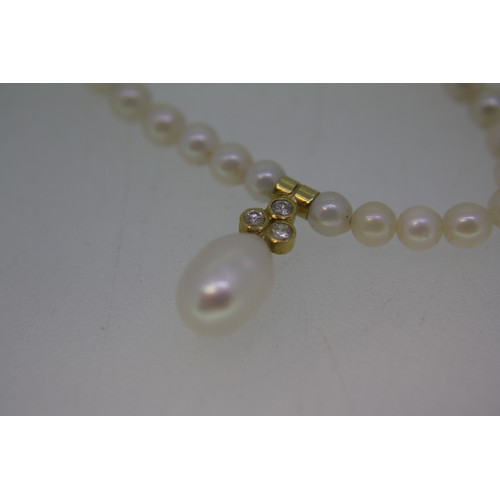 60 - A seed pearl and diamond choker with 18 ct gold clasp