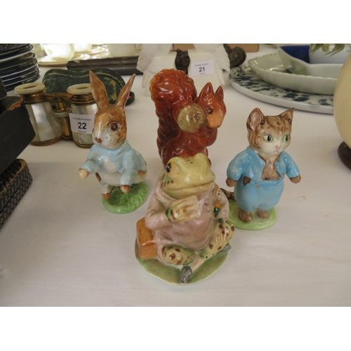 20 - Four Beswick Beatrix Potter Peter Rabbit figures, some gold back stamps