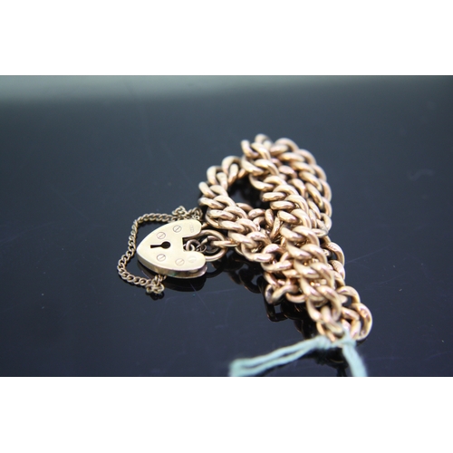 39 - 9ct gold link bracelet, 10.8grams, with a padlock