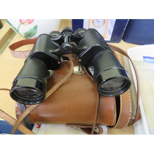 149 - Cased pair of Wray 9x40 binoculars