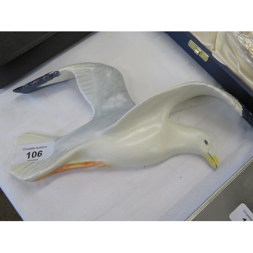 106 - A pottery wall piece of a Gull in flight - length 9.5 ins approx.