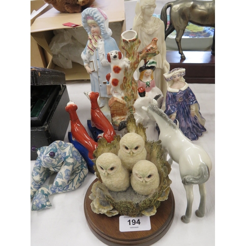 194 - A collection of figures, porcelain pottery animals, border fine arts owls etc