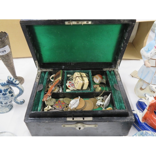 195 - A jewellery box containing badges, odd costume jewellery items, coins etc