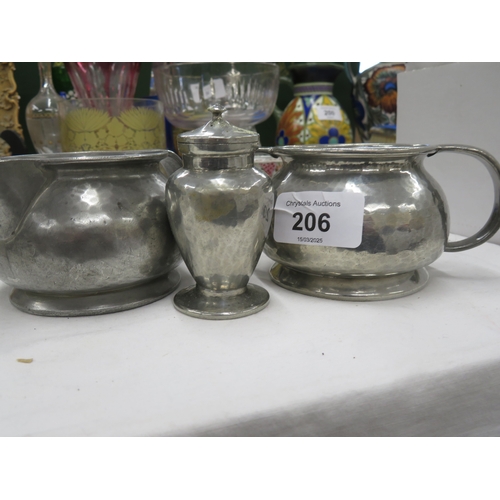 206 - Tuderic Liberty & Co., pewter cream jug and sugar bowl number 01075 plus a pepper pot